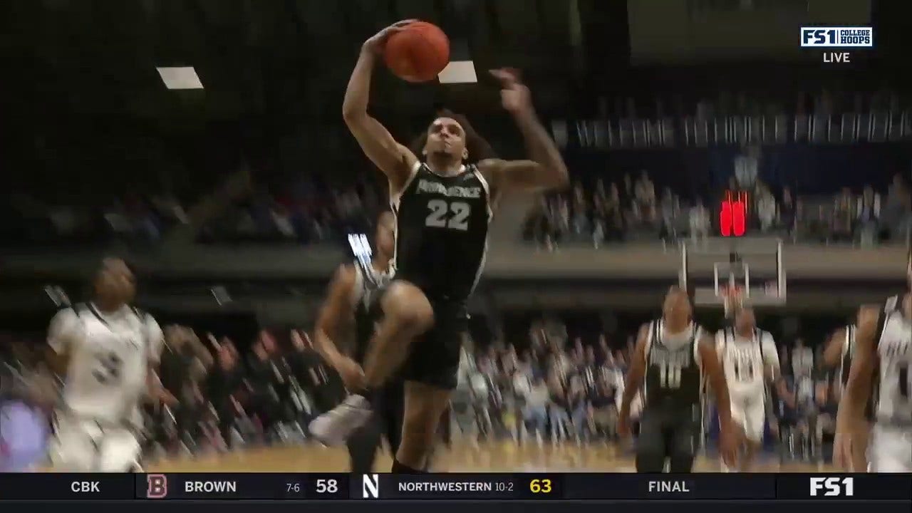 Providence's Devin Carter throws down a WILD dunk vs. Butler