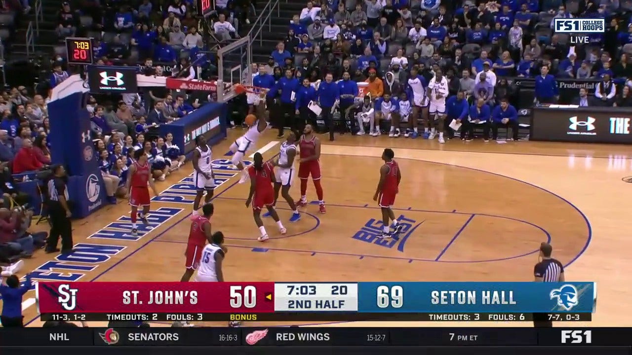 Seton Hall's Dre Davis throws down the huge two-handed dunk to increase the lead over St. John's