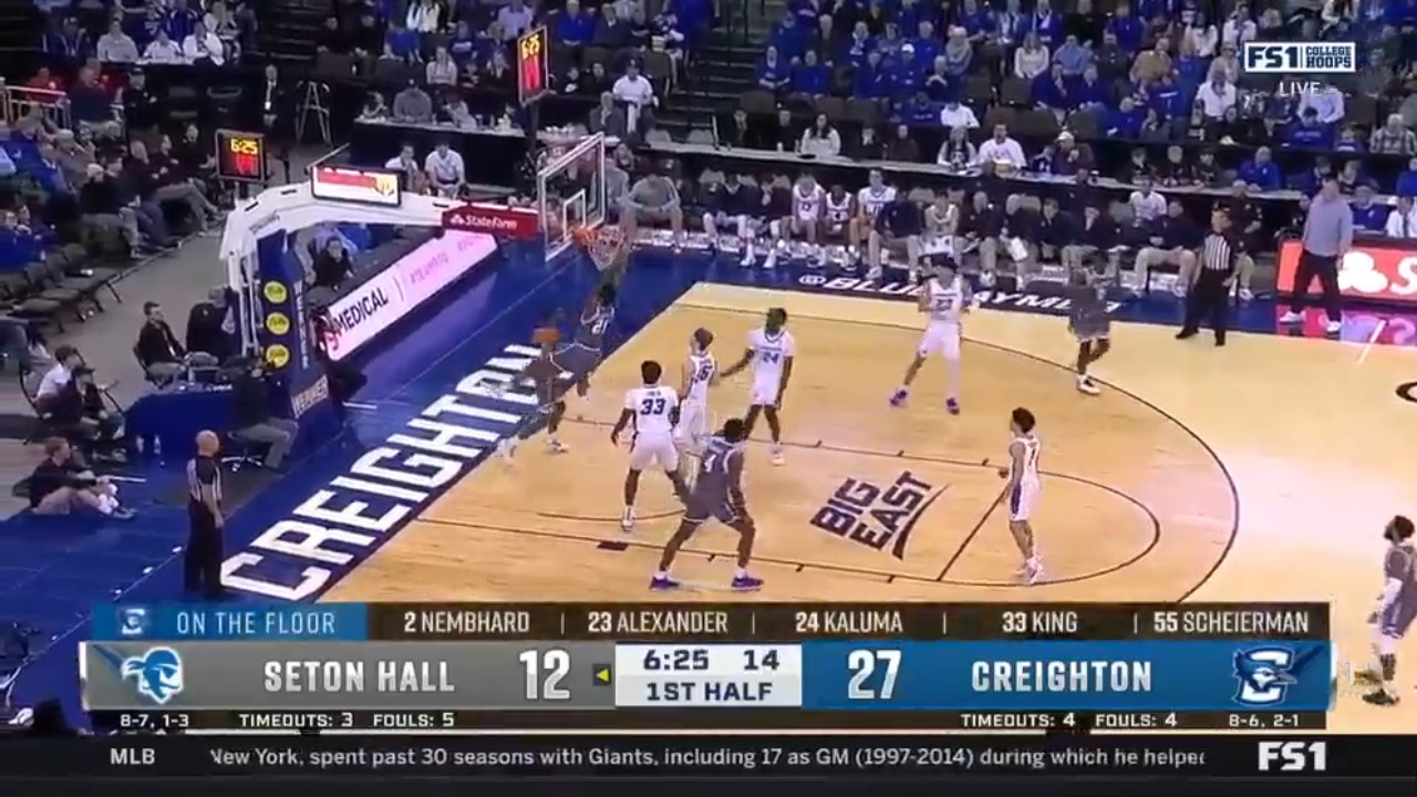 Seton Hall's Femi Odukale throws down a powerful two-handed dunk, resulting in a technical foul