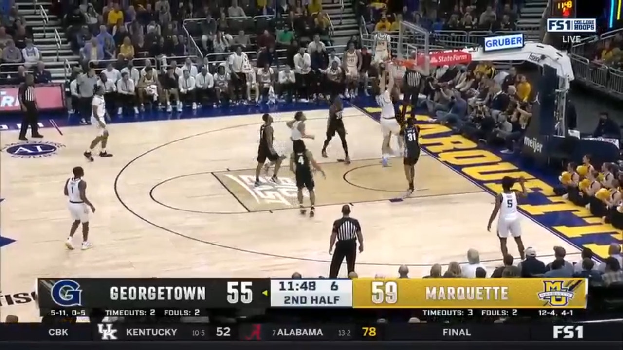 Ben Gold throws down a nasty jam extending Marquette's lead against Georgetown