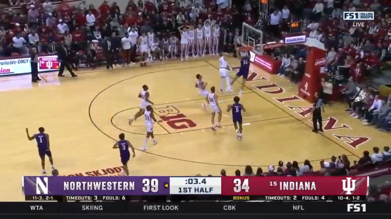 Matthew Nicholson hangs on the rim to close out first half for Northwestern 41-34 against No. 15 Indiana