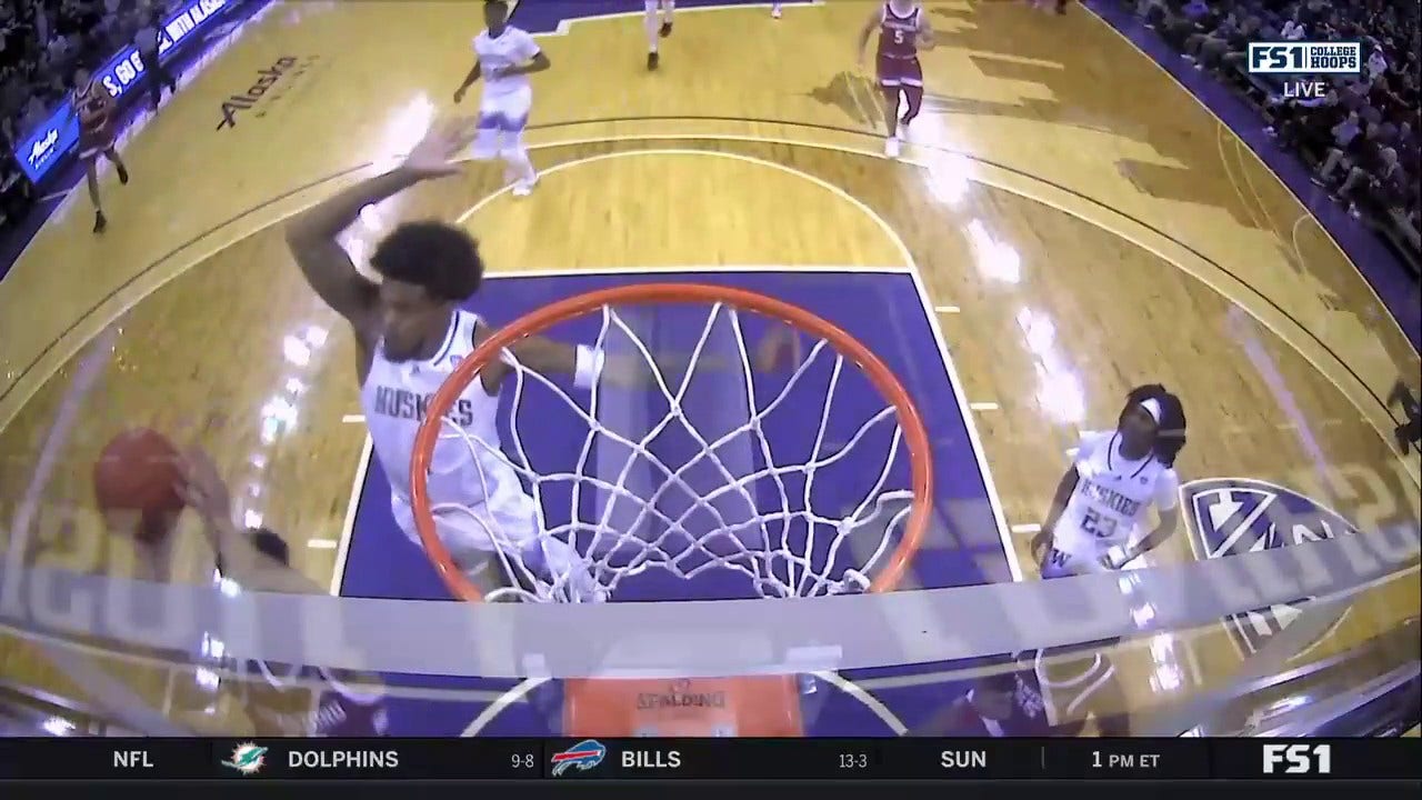 Washington's Keion Brooks records an ABSURD block to start the game against Stanford