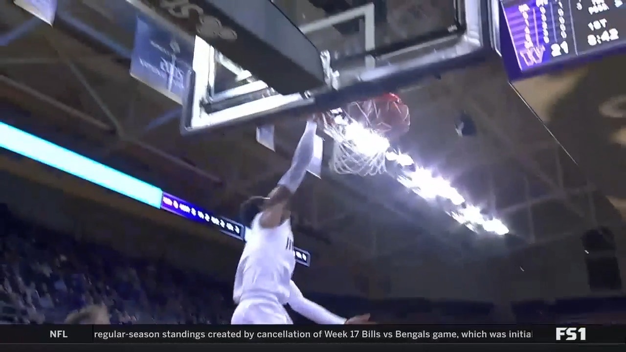 Koren Johnson picks Stanford's pocket resulting in a NASTY fast-break jam from PJ Fuller II to increase Washington's lead