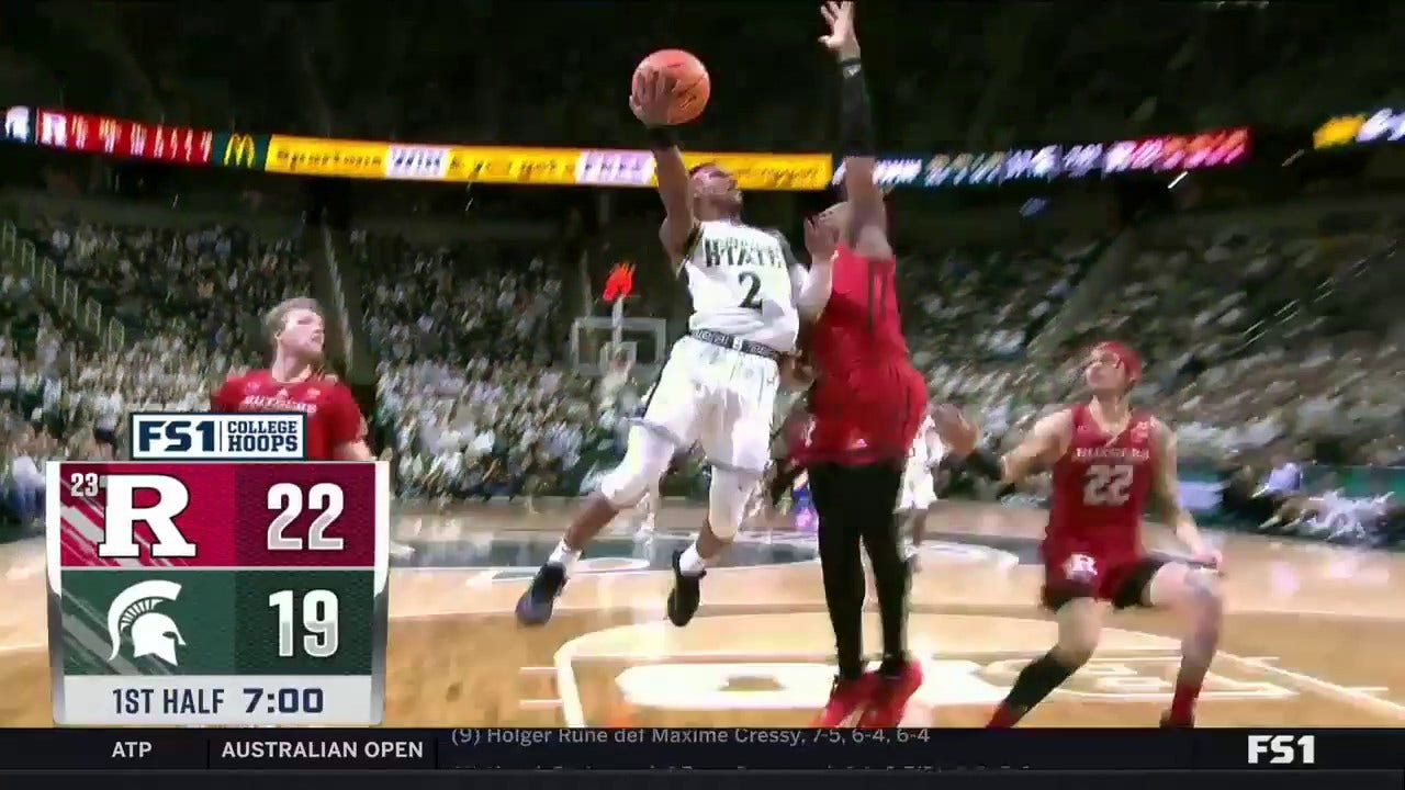 Michigan State's Tyson Walker finishes WILD acrobatic layup to trim Rutgers' lead
