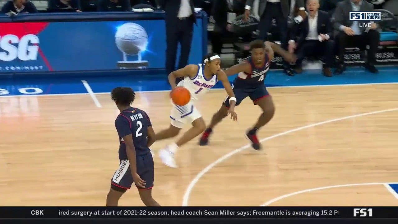 DePaul's Javan Johnson hits a tough one-handed shot and draws the foul