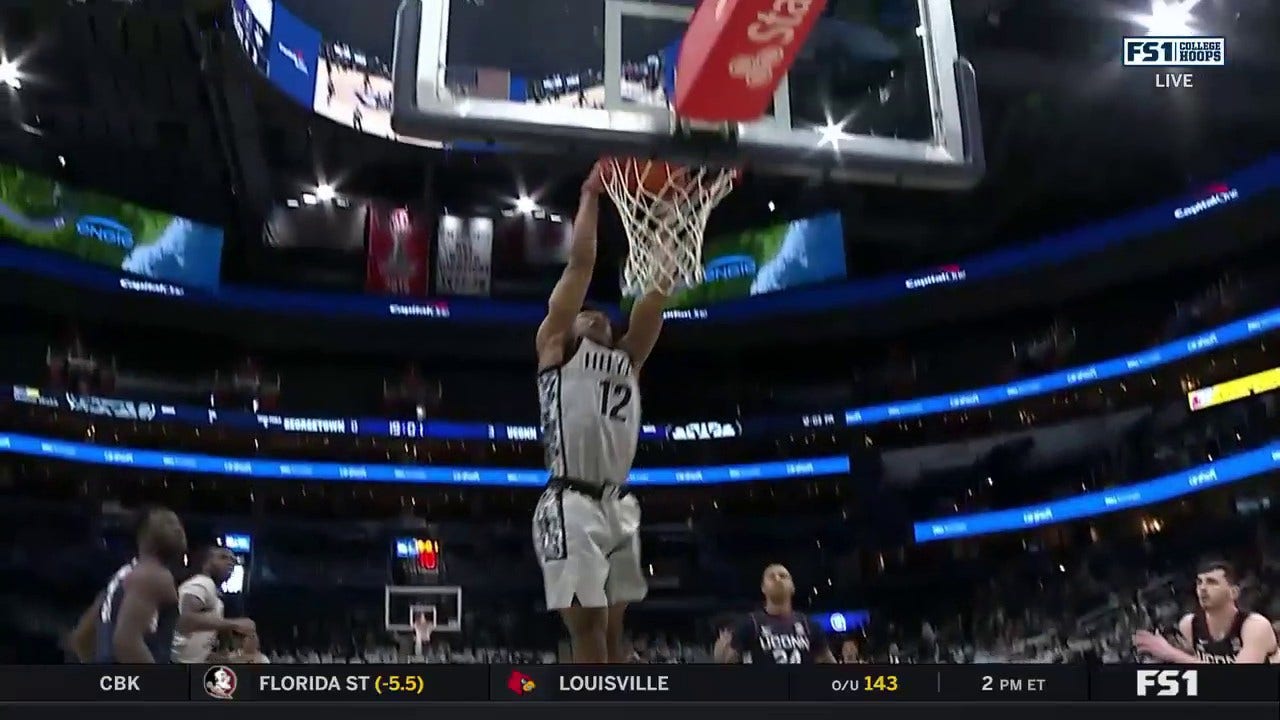 Jordan Riley throws down a dunk as Georgetown gets started early