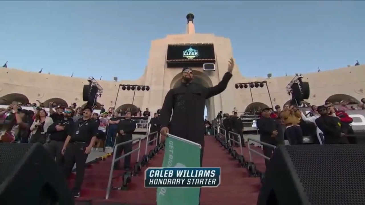 USC's Caleb Williams raises the green flag as the honorary starter for The Clash at The Coliseum | NASCAR on FOX
