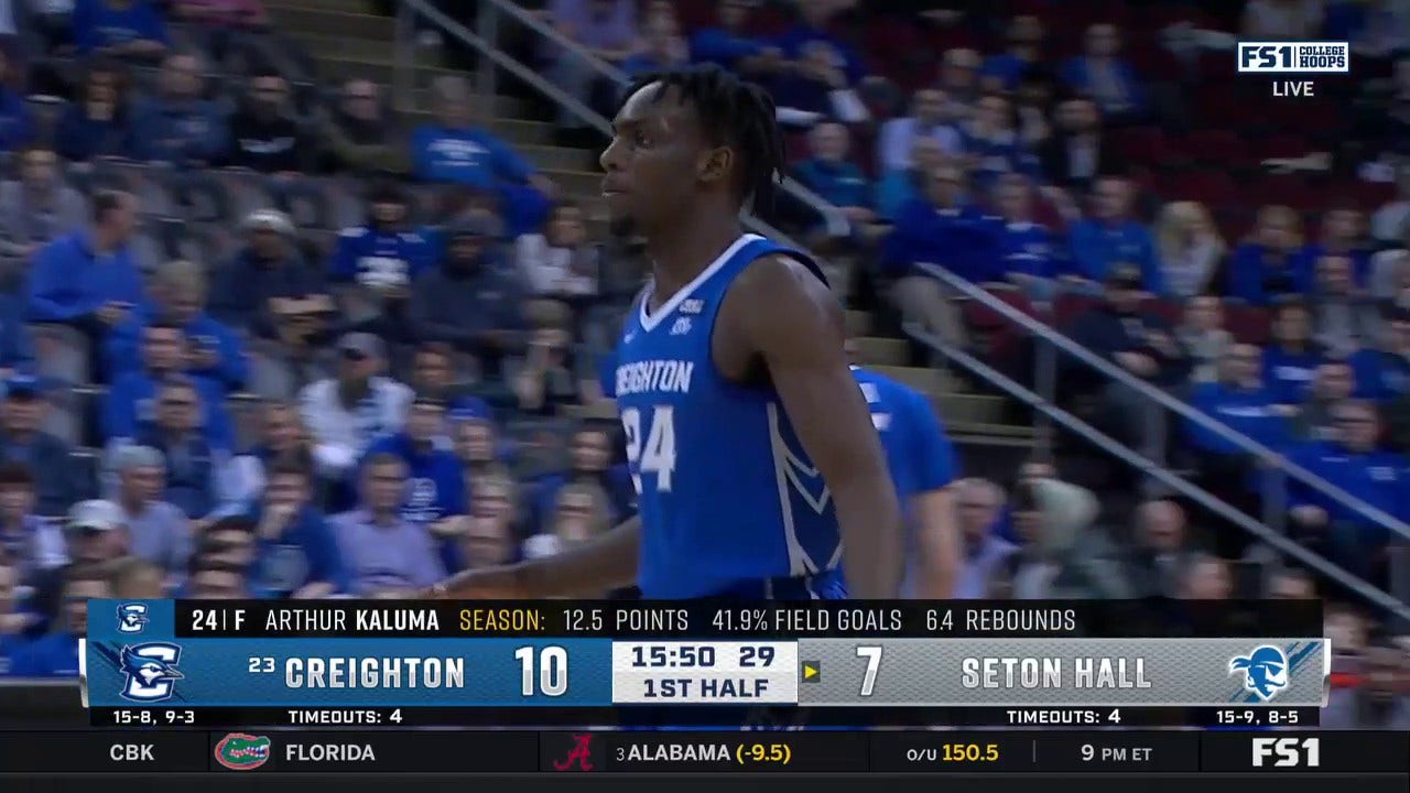 Arthur Kaluma throws down a powerful dunk to extend Creighton's early lead over Seton Hall