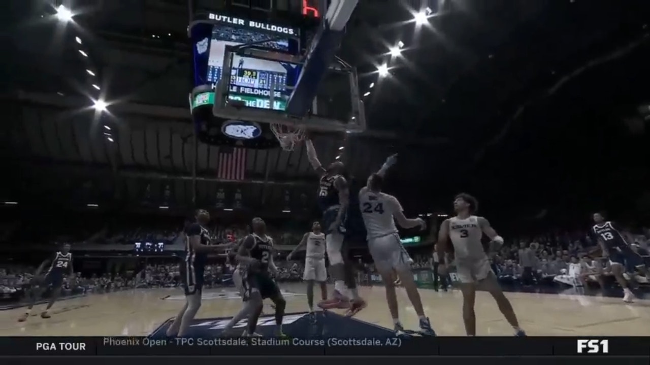 Butler's Manny Bates posterizes Jack Nunge heading into halftime at Hinkle Fieldhouse 