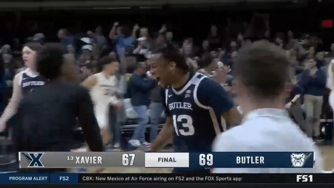 Fans storm the court after Eric Hunter Jr.'s goal tended shot proves to be the difference in Butler's upset over No. 13 Xavier
