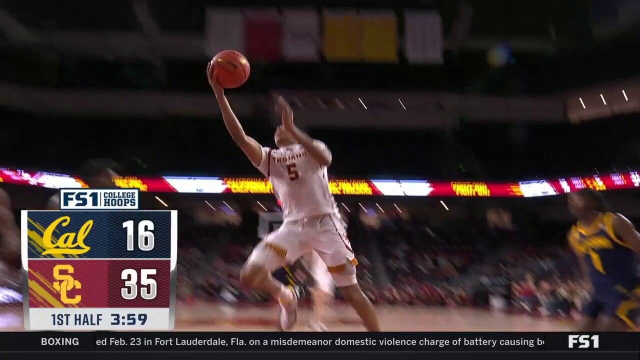 Boogie Ellis hits a layup plus a foul to extend USC's lead over Cal