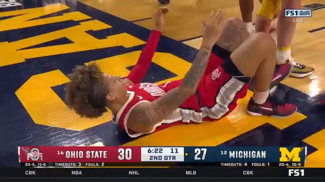 Ohio State's Rikki Harris gets a tough And-1 finish to extend the lead against rival Michigan
