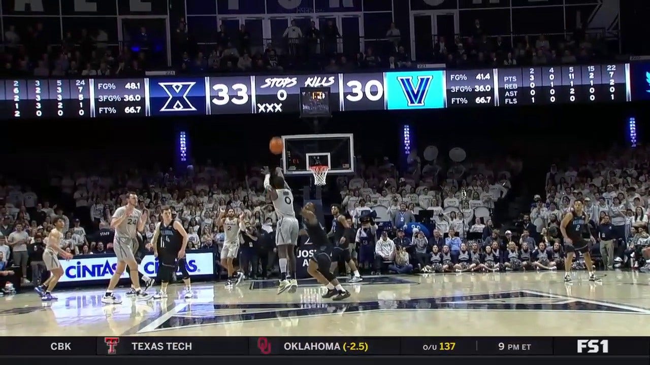 Xavier's Souley Boum hits a DEEP buzzer-beater heading into the half