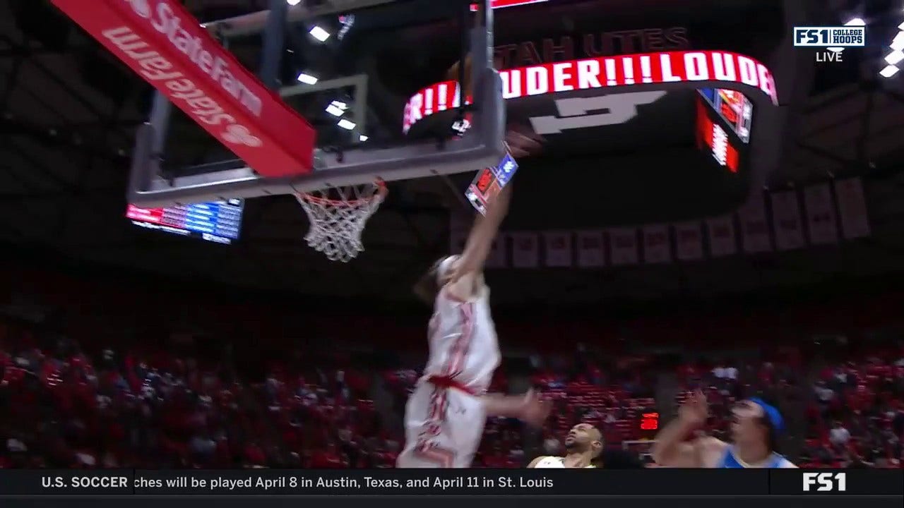 Utah's Branden Carlson records an EMPHATIC block on UCLA's Jaime Jaquez Jr.