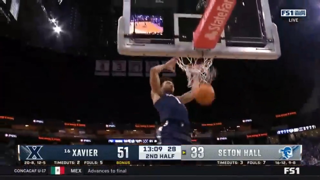 Desmond Claude pick-pockets Seton Hall and finishes with a two-handed flush extending Xavier's lead