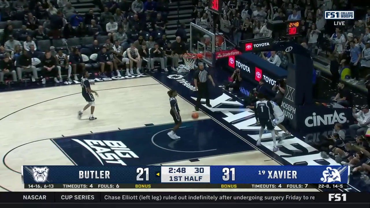 Xavier's Cesare Edwards scores a quick bucket thanks to Colby Jones' quick half-court pass