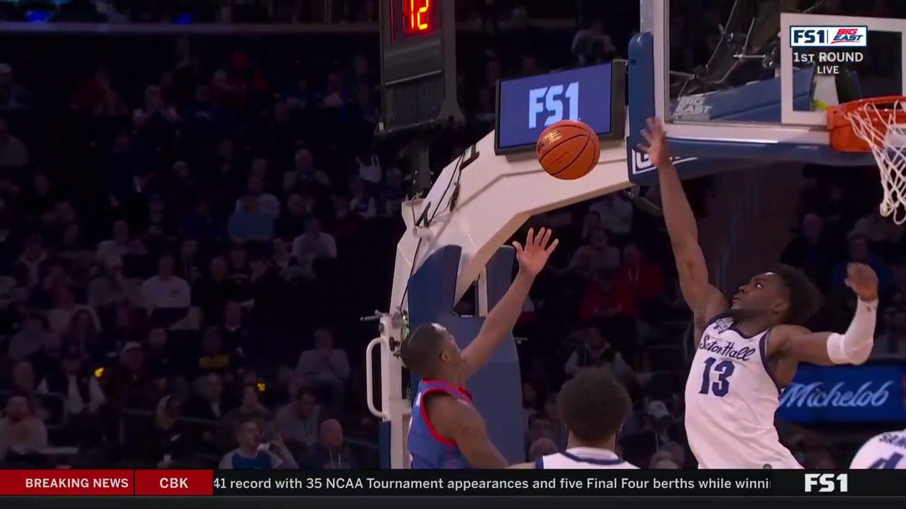 Seton Hall's KC Ndefo delivers a mean block against DePaul