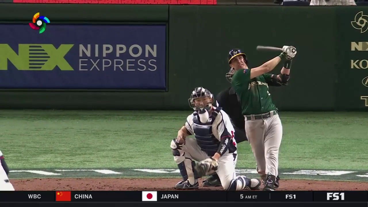 Australia's Robbie Glendinning hits a home run against the Republic of Korea