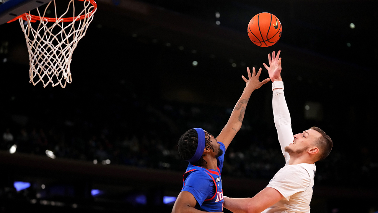 Xaviers' Jack Nunge posts a double-double with 23 points and 10 rebounds in 89-84 win over DePaul to head to the Semifinals