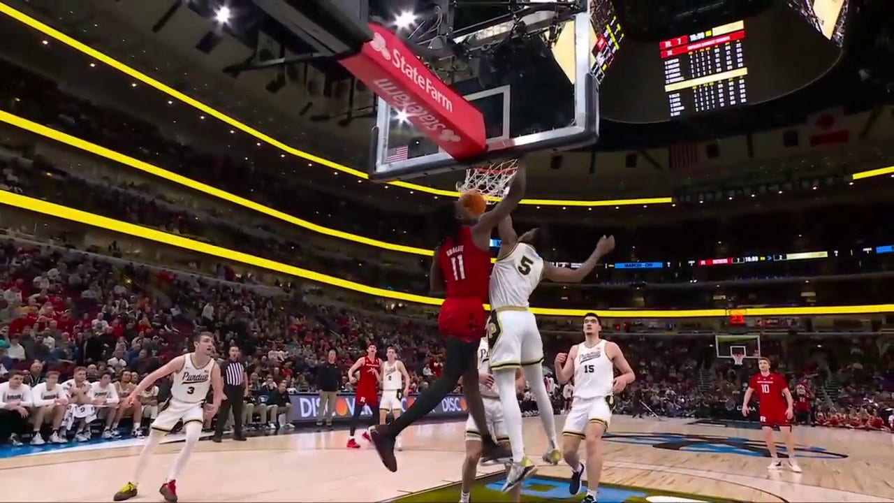 Rutgers' Clifford Omoruyi drops a one-handed reverse dunk against Purdue in the Big Ten Tournament