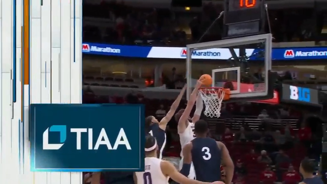 Northwestern's Boo Buie finds Matthew Nicholson for an alley-oop dunk over Penn State