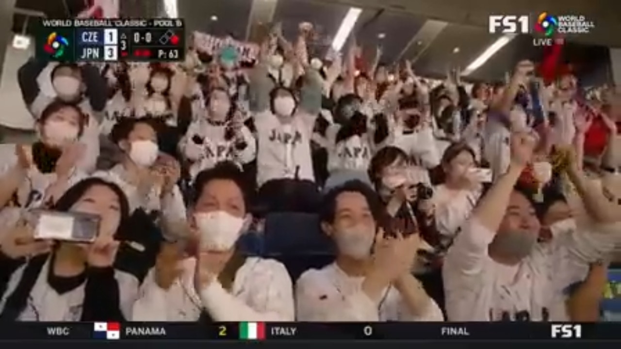 Shohei Ohtanis helmet falls off as he strikes out but his teammates pick him up as Japan scores three runs in the third FOX Sports