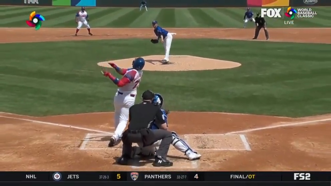 Cuba's Erisbel Arruebarrena smokes a two-run blast to center field, capping a four-run first inning