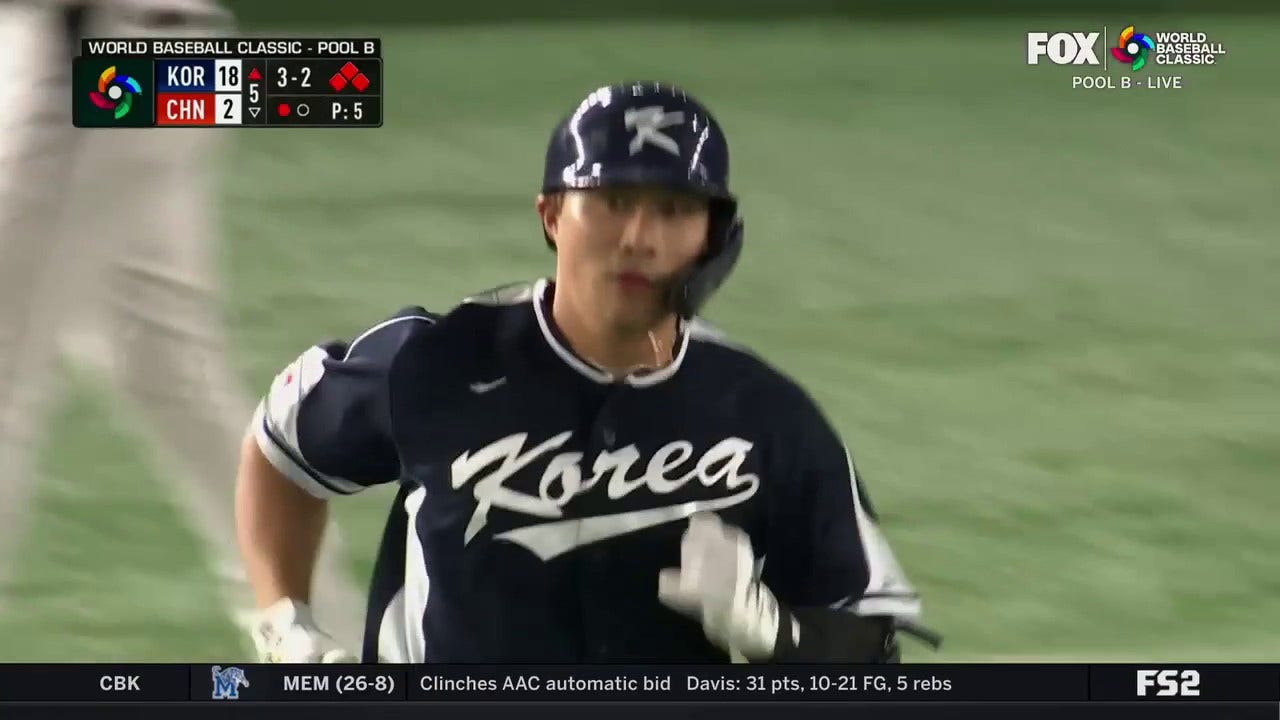 Ha-Seong Kim belts a grand slam to left field, giving Korea a 22-2