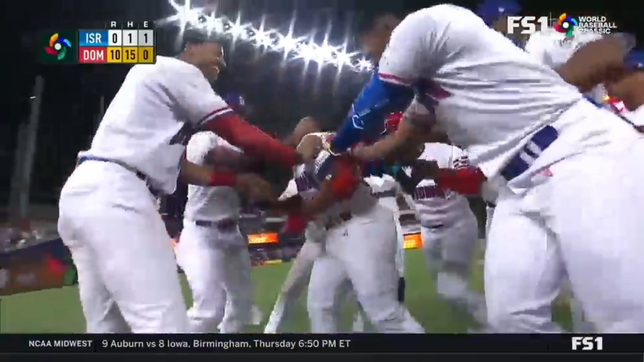 Dominican Republic's Jean Segura crushes a walk-off double for a 10-0 mery-rule victory against Israel