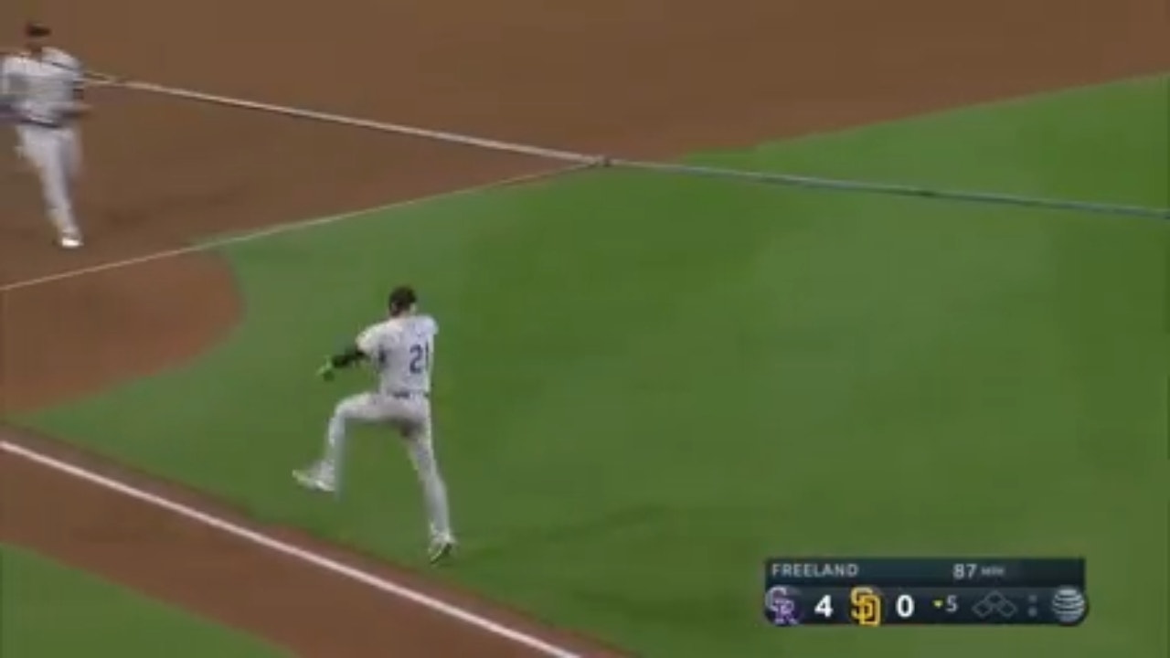 Rockies' pitcher Kyle Freeland shows off his athleticism with a leaping throw to get Padres' Austin Nola out at first