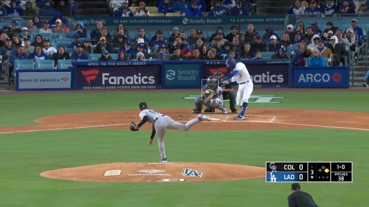 Chris Taylor smacks a two-run homer to give the Dodgers an early 2-0 lead over the Rockies