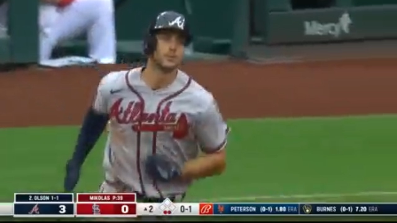 Matt Olson crushes a home run to center field, extending the Braves' lead over the Cardinals