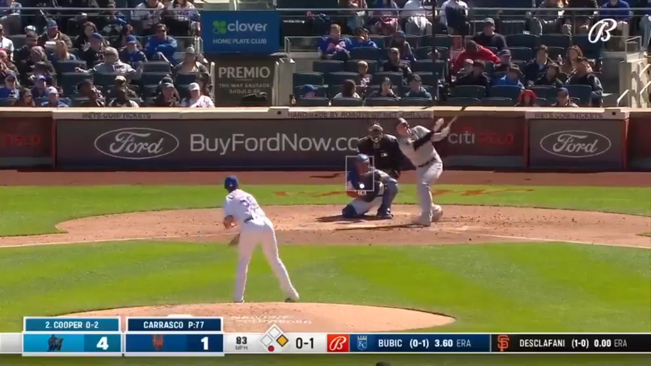 Marlins' Garrett Cooper smashes a two-run homer against the Mets to increase the lead