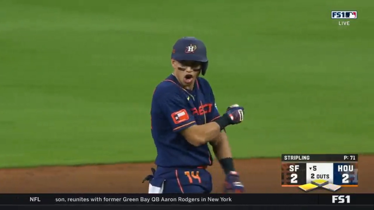 Mauricio Dubón singles in the fifth to drive in another Astros run against the Giants