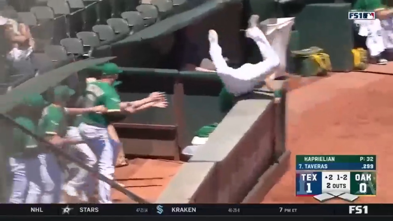 A's Jace Peterson makes a WILD catch and lands in Oakland's bullpen to get out of the inning against the Rangers