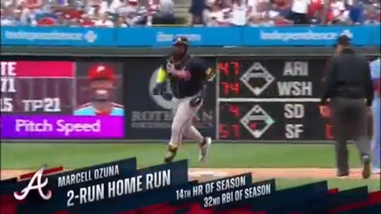 Marcell Ozuna homers as part of a five-run tenth inning in the Braves' 5-1 victory over Phillies