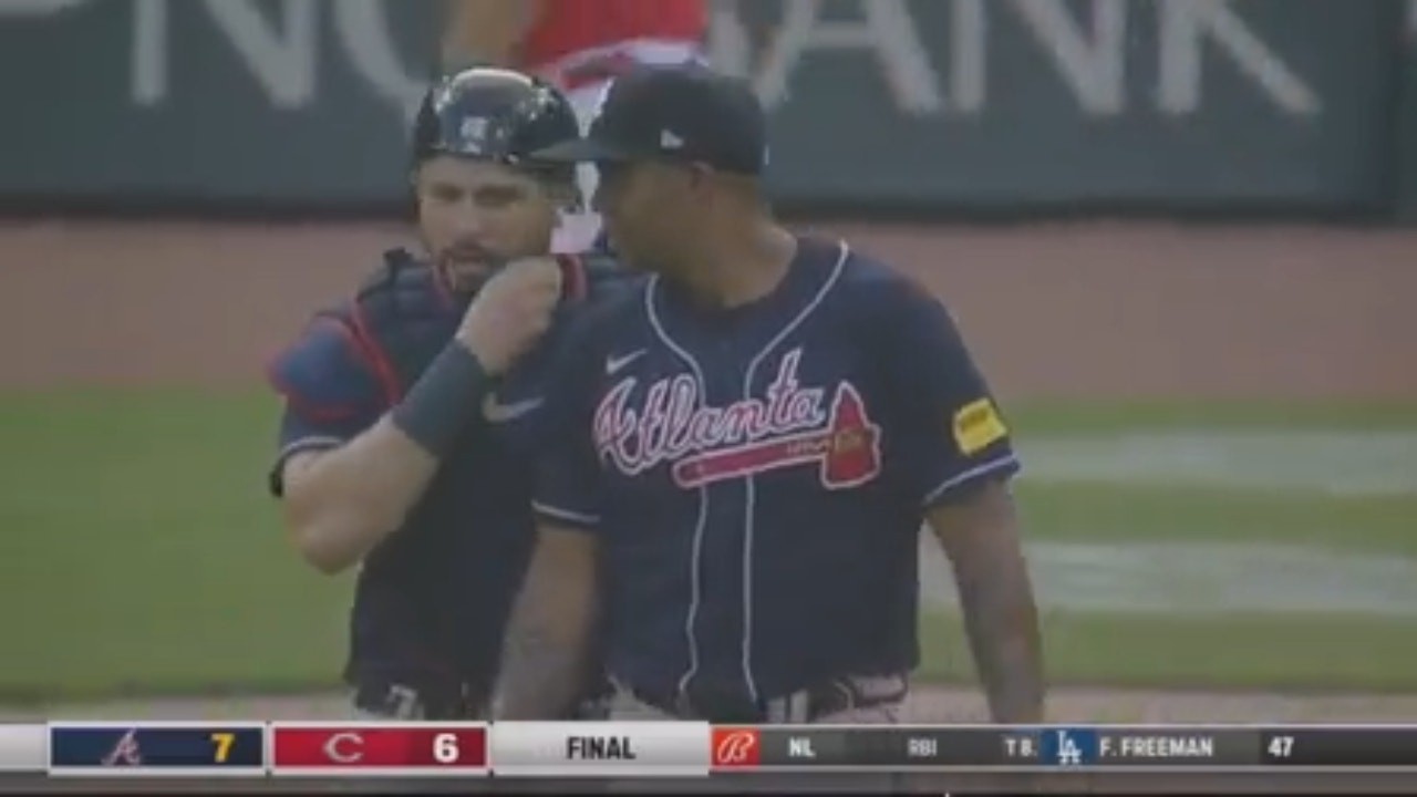 Reds hit two homers in the ninth but fall short of comeback as Braves snap their 12-game winning streak