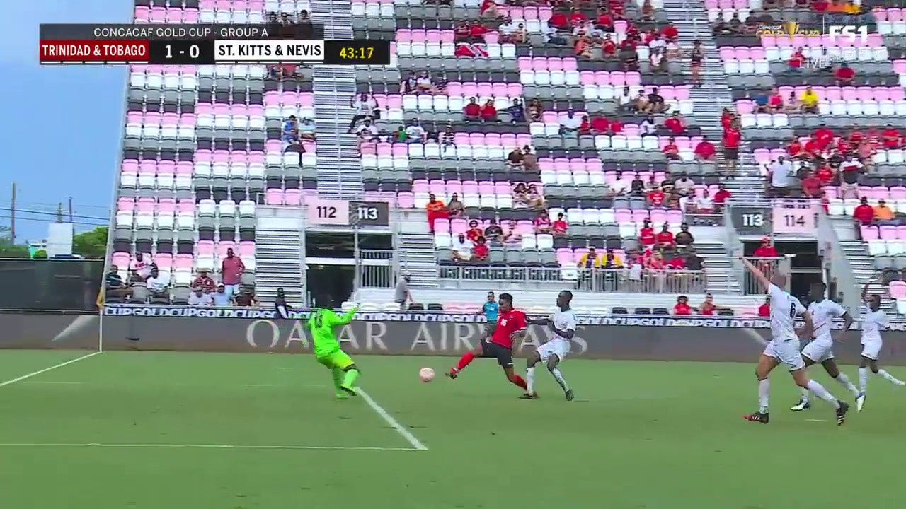 Trinidad and Tobago's Alvin Jones nets a BEAUTIFUL shot to take the lead over Saint Kitts and Nevis