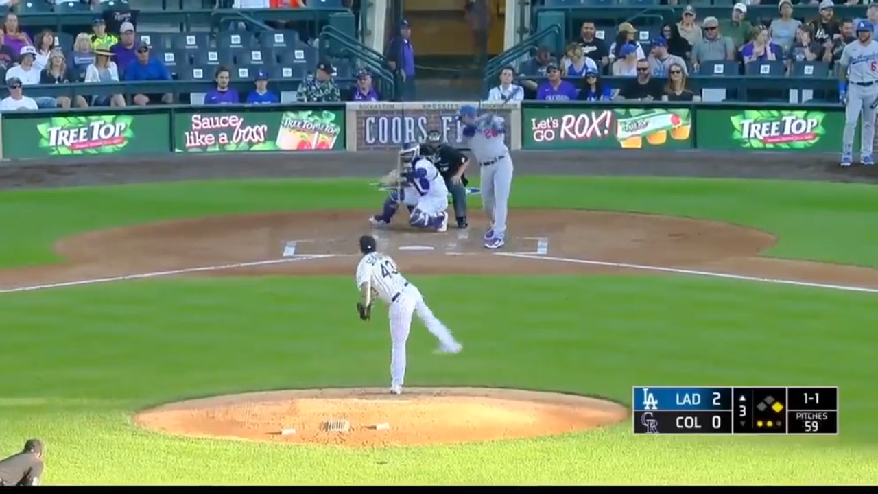 J.D. Martinez SMASHES a two-run home run to extend the Dodgers' lead over the Rockies