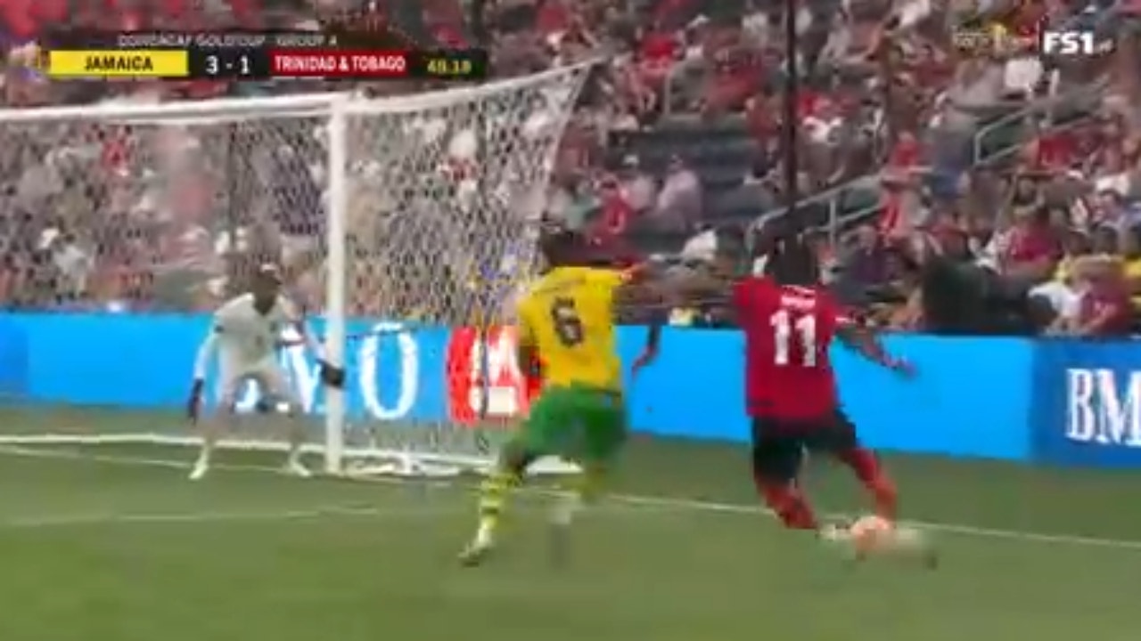 Andre Rampersad scores to get Trinidad and Tobago on the board against Jamaica