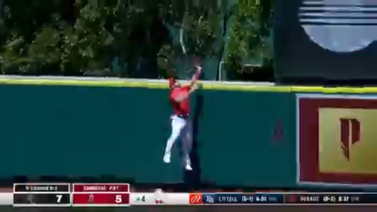 Angels' Mike Trout makes a SPECTACULAR leaping grab to rob the White Sox of a homer in center field