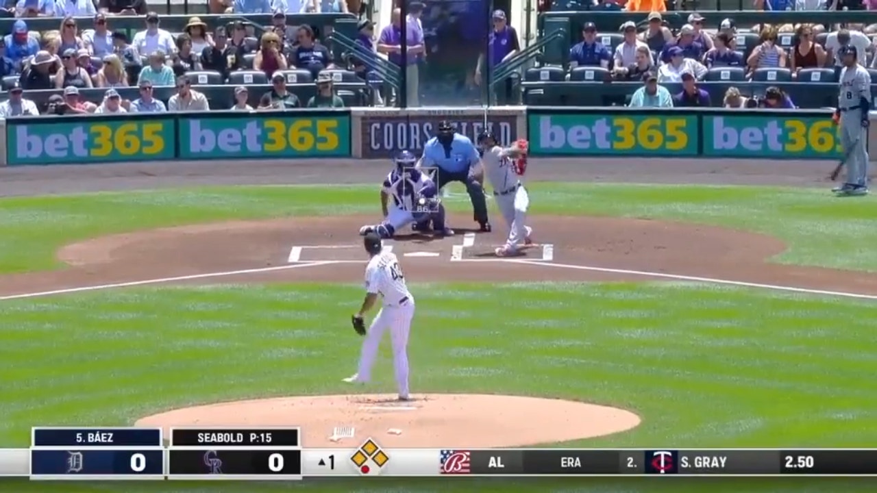 Javier Báez smacks a grand slam to give the Tigers an early lead over the Rockies