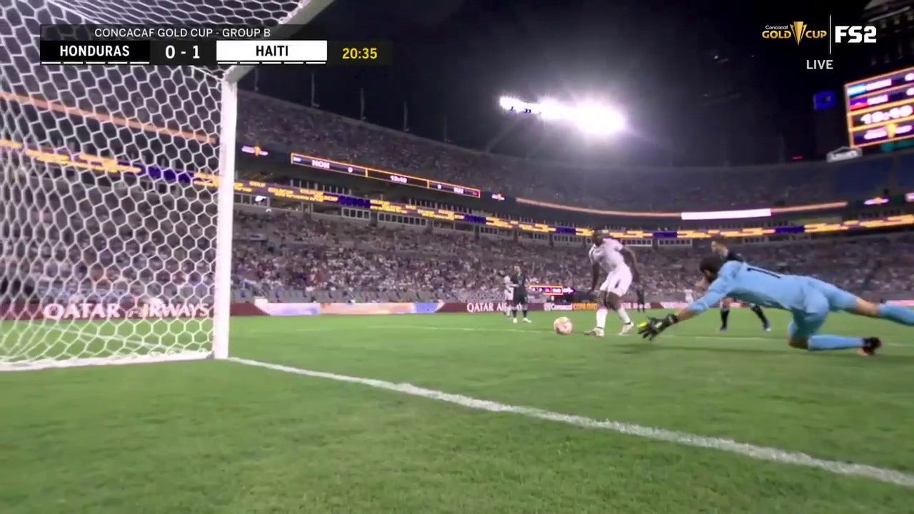 Haiti's Frantzdy Pierrot scores his second goal of the tournament to go up 1-0 against Honduras