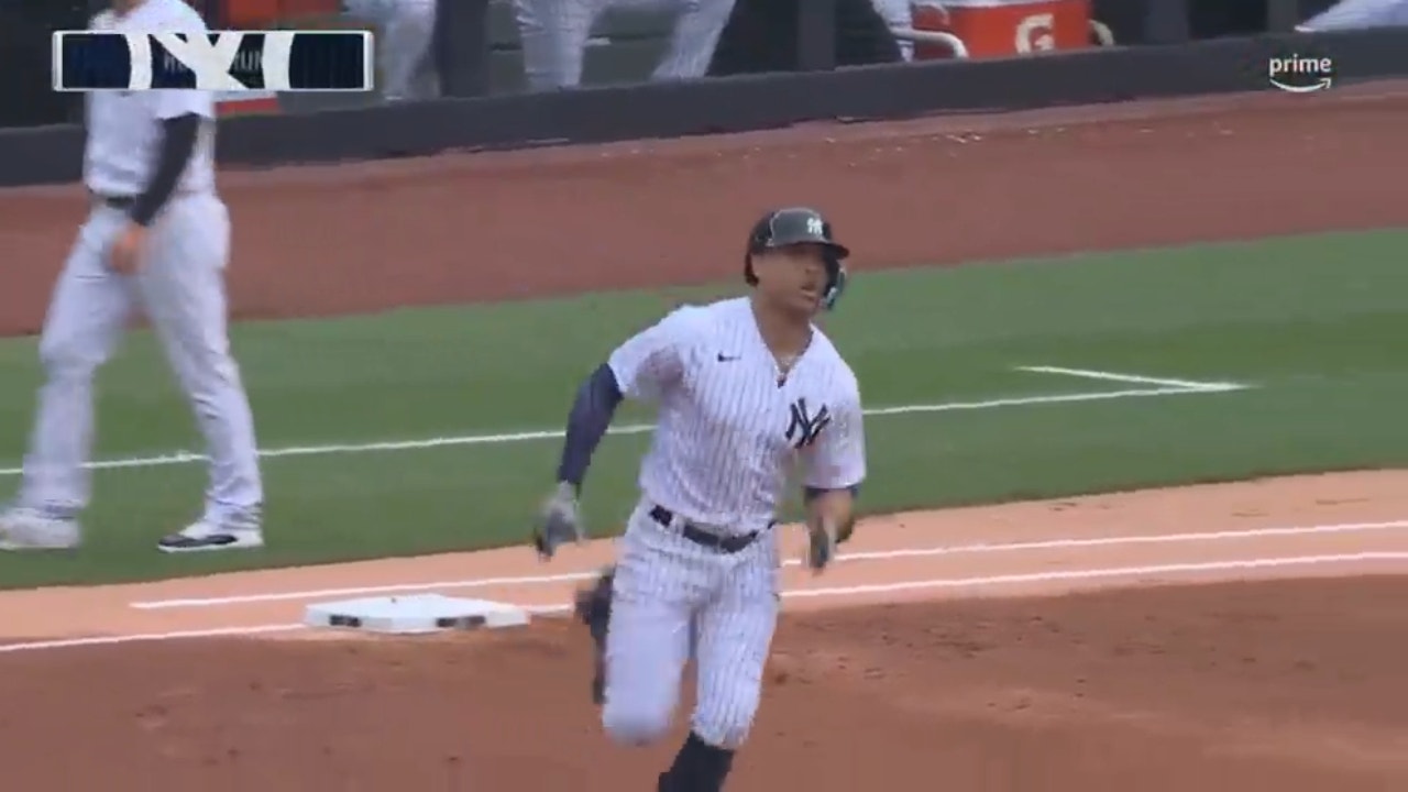 Yankees' Giancarlo Stanton muscles a 447-foot go-ahead homer off Cubs' Drew Smyly in the first inning