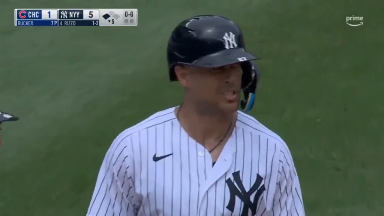 Giancarlo Stanton SMACKS his second homer of the game to give the Yankees a 6-1 lead over the Cubs