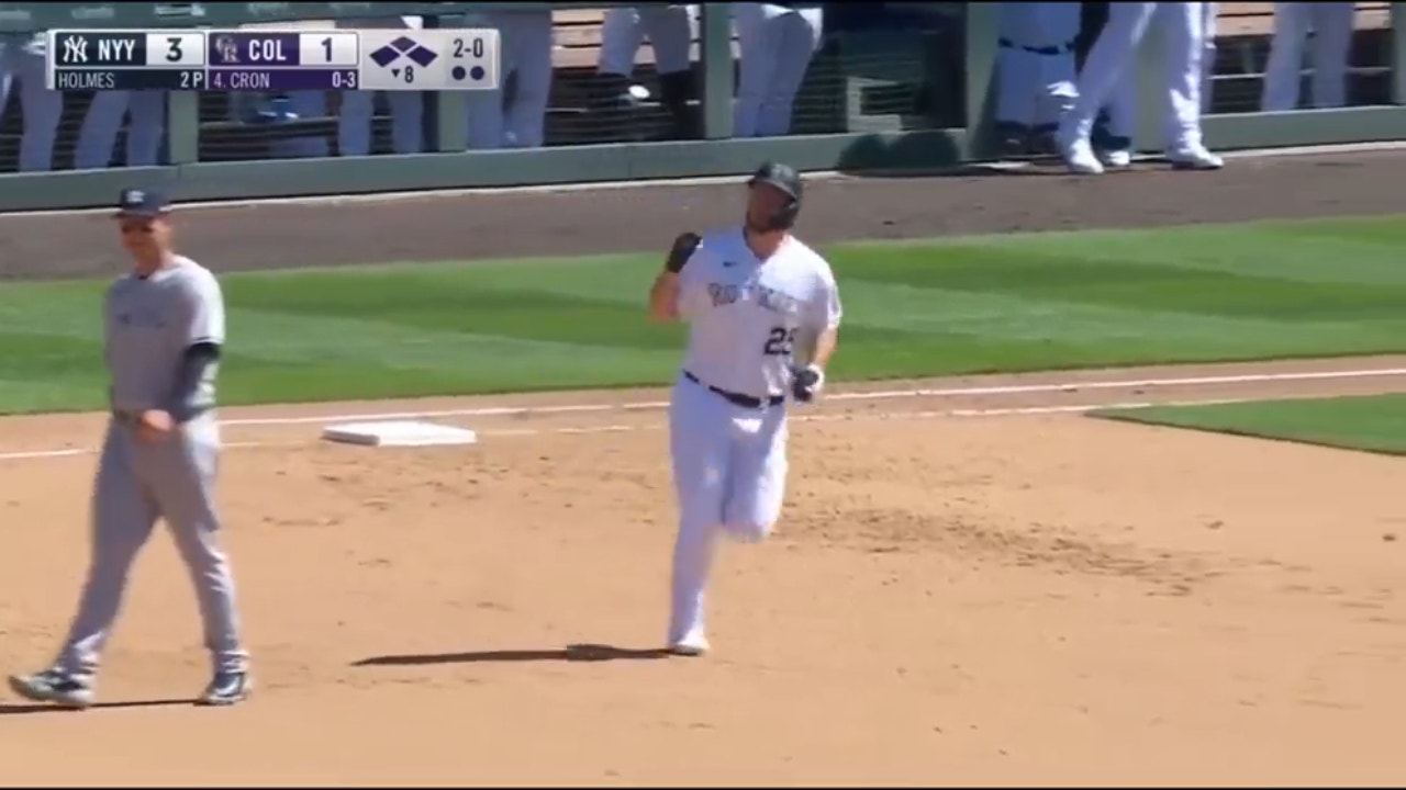 Rockies' C.J. Cron smashes a go-ahead grand slam against the Yankees in the eighth inning
