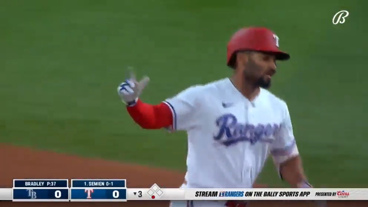 Marcus Semien SLUGS a solo home run to give the Rangers an early lead over the Rays