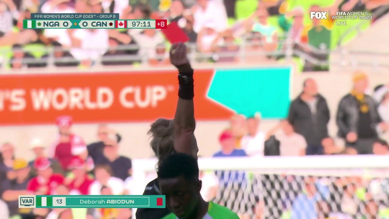 Nigeria's Deborah Abiodun receives a Red Card in stoppage time against Canada
