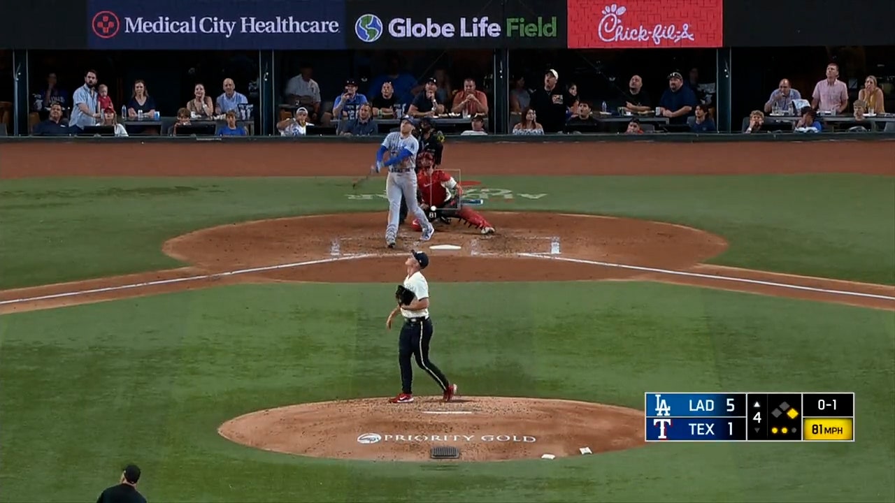 Freddie Freeman blasts his second home run of the game to help the Dodgers increase the lead over the Rangers