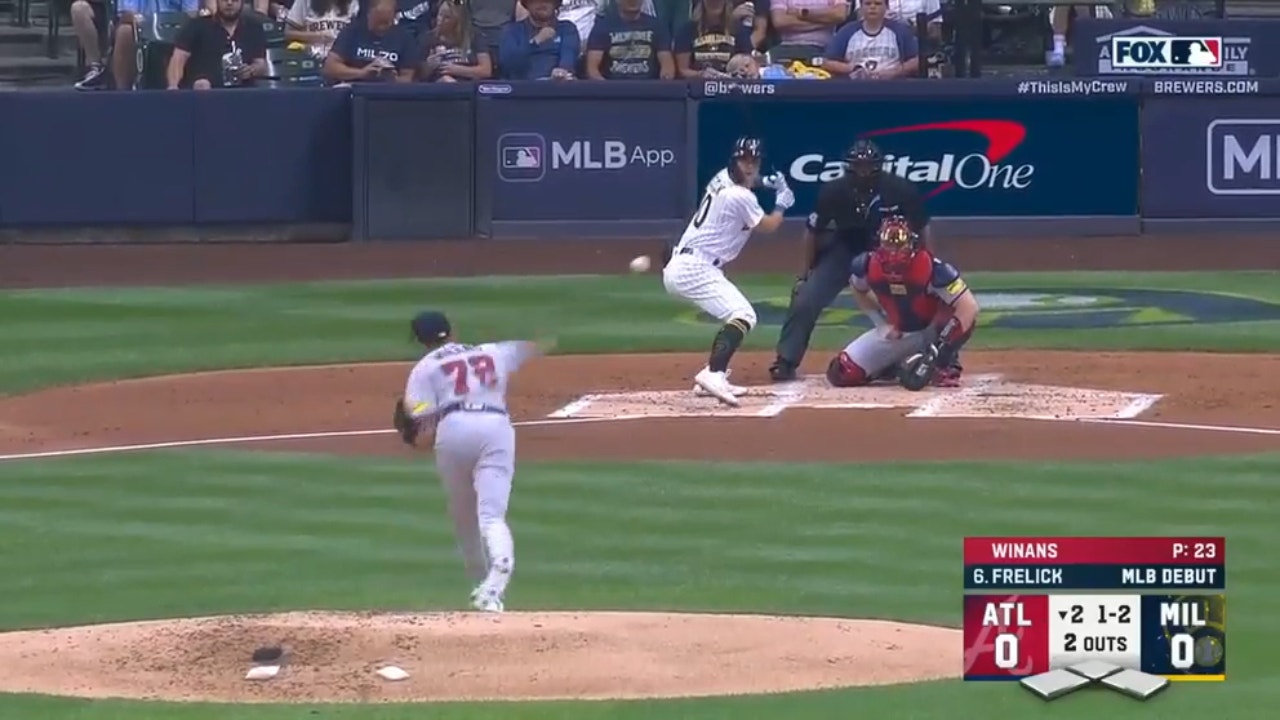Brewers top prospect Sal Frelick hits a single against the Braves in his first major-league at-bat